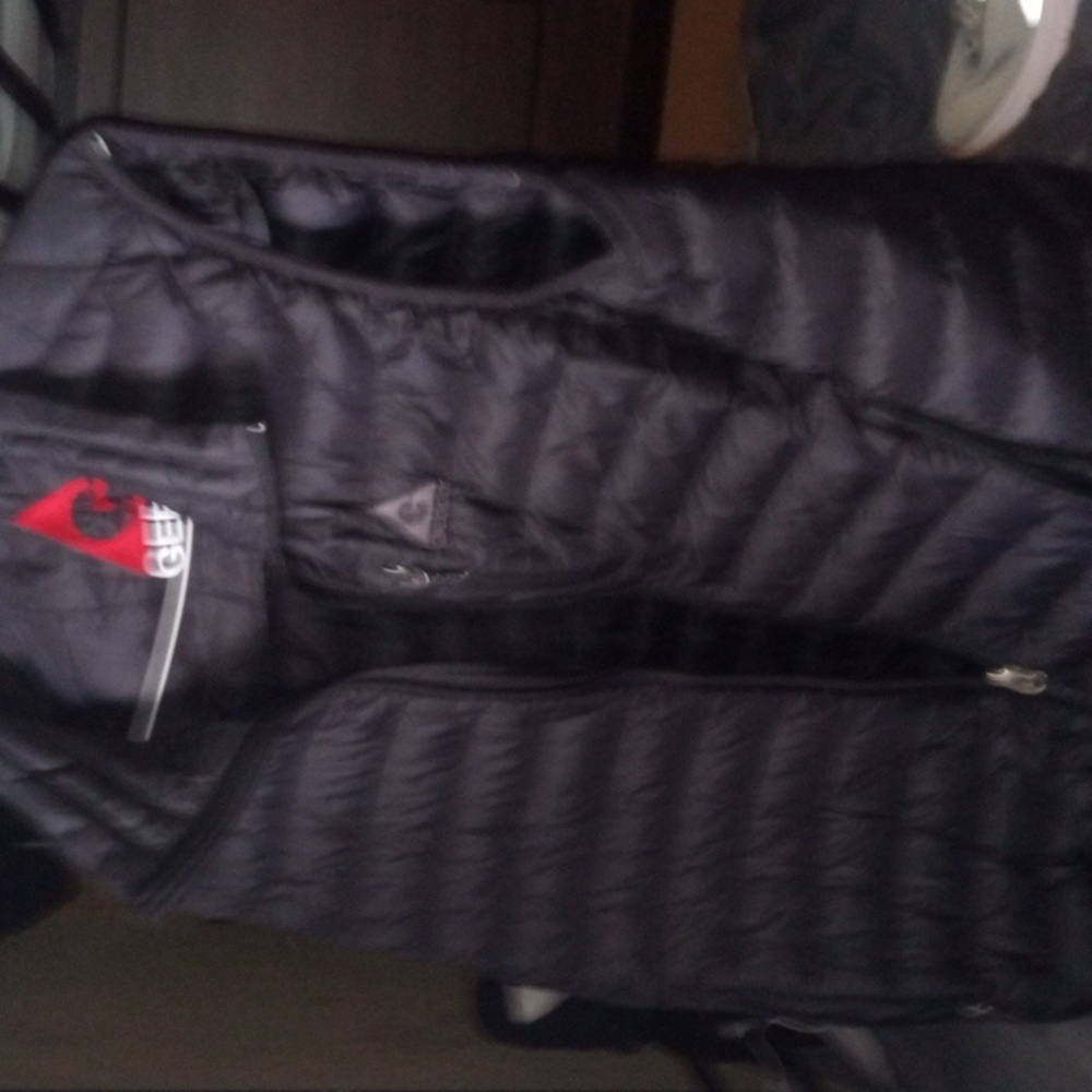 Gerry puffer sleveless, brand new condition,!!!! 21$